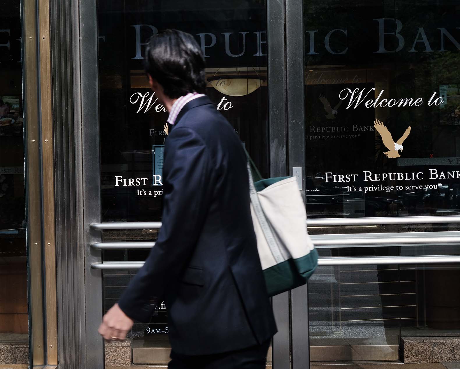 Man passing by First Republic Bank